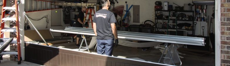 Benefits of Replacing a Damaged Garage Door Panel Quickly